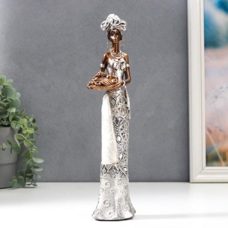 Polystone souvenir "African in silver. Tortard with a pearl with a fruit plate" 32x7x9.5 cm