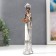 Polystone souvenir "African in silver. Tortard with a pearl with a fruit plate" 32x7x9.5 cm