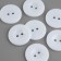 Button 2 punctures, d = 25 mm, white color