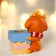 Souvenir Polystone SPRISE "Gobby in a scarf with a cake"