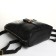 City backpack on a zipper, black color