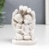 Polystone souvenir "Snow -white angels leaned against the palm" 8.7x6x6 cm