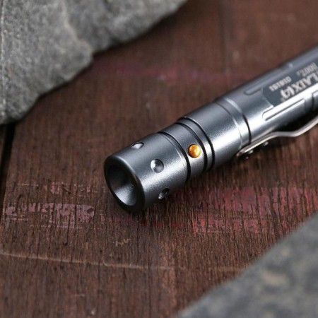 A glass-glass with a flashlight and a knife. Mix-4