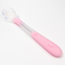 A spoon for nursery for feeding silicone, from 5 months, pink color