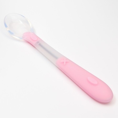 A spoon for nursery for feeding silicone, from 5 months, pink color