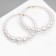 Ring earrings “Tenderness of pearls” are large, white color in gold, D = 8 cm
