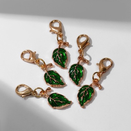 Charm "leaf", green color in gold-1
