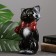 The piggy bank "Small cat with a rose" black, 20cm