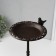 Souvenir of cast iron stand "Bird on openwork rack" 22x24x38 cm