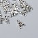 Decor Metal for creativity "Skull with bones" silver G057B566 set 25 pcs 1.3x0.8 cm