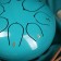 Musical instrument glucophone, green, 8 petals, 15 x 9 cm