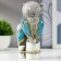 Souvenir Polystone "Gray Eagle with blue wings, with a stump of hemp" 16.8x9.5x5 cm