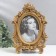 Photo frame Polystone 10x15 cm "twisted petals" aged gold 18x27.5 cm