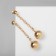 Earrings Metal "Bohemia" balls on a chain, color gold