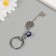 Keychain from the evil eye Metal "key with a lion" 2.5x6.2 cm