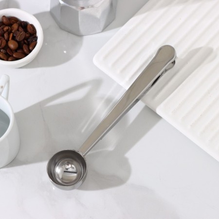 Spoon for coffee aroma, with a clamp, silver color
