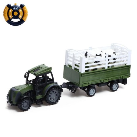 The radio -controlled “farmer” tractor, with a trailer and animal, works from batteries, mix