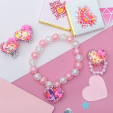 Set of children's “chosen” 3 subjects: clips, ring, bracelet, hearts, sparkles, white-pink color