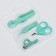 A child’s care set, 5 items (comb, tweezers, scissors, a knipser, saw), green color