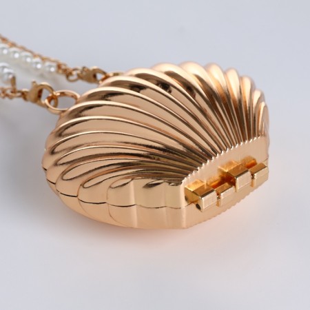Female bag on a magnet, gold color-7