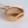 Female bag on a magnet, gold color