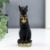 Polystone souvenir "Black Sphinx with gold ears, with patterns" 13x6.5x5 cm