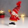 Polystone souvenir "Snowman in a red fur coat, striped cap and scarf" 14x10.5x5 cm