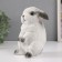 The piggy bank "Rabbit No. 4 is white with black tips" height 17.5 cm, width 11.5 cm, length 11.5 cm.