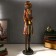 Souvenir Polystone "Leo in brown-green camisole in a hat with a pen" 52.5x11.5x13 cm