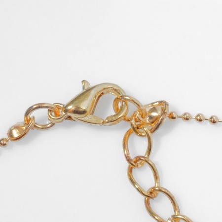 Piece "horseshoe", white color in gold, 45 cm-1
