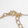 Piece "horseshoe", white color in gold, 45 cm