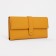 Women's wallet on the button, yellow color