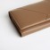 Women's wallet on a magnet, the color is light brown