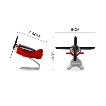 A toy on a car panel, a plane, a propeller spins from the sun, black-1