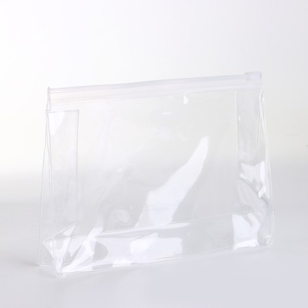 Cosmetic bag with a zip-gl.