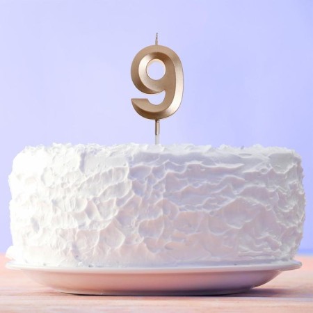 Candle for the cake, number "9", champagne.