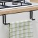 Holder for towels on the door, black color