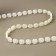 Pearls on threads, flat, 10 mm, 9 ± 1 m, milk color