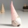 Polystone souvenir "Santa Claus in a pink cap, the cap pulled over" 8.5x8x20.5 cm