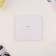 A wedding invitation with the ribbon "for our wedding"
