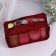 Cosmetic bag with lightning, burgundy color