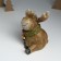 Souvenir Polystone "Losik Smile in a spruce wreath with a bow and bell" sits 13.5x11x16 cm 10325