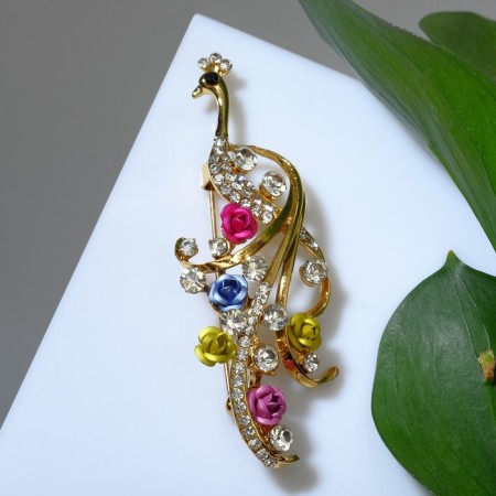 Brooch "Firebird", tail with flowers, colored in gold