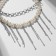 Moloderic "bead" waterfall, white in silver