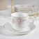 Tea ceramic service on a metal stand “Rose”, 19 objects: 6 cups 170 ml, 6 saucers 13.5 cm, 6 spoons, white color