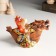 Piglite Polystone "Dragon on a Paradon boat" MIX 12x6.8x7.8 cm