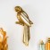 Panel interior polystone "Mirror parrot with patterns" gold 13x4x30 cm
