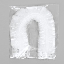 A single shower cap, in individual packaging