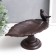 Souvenir cast iron stand "Bird on the sheet" 13x14x23 cm