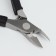 Pigitan nippers, hidden spring, rubberized pen, 11 cm, blade length - 12 mm, silver/black color